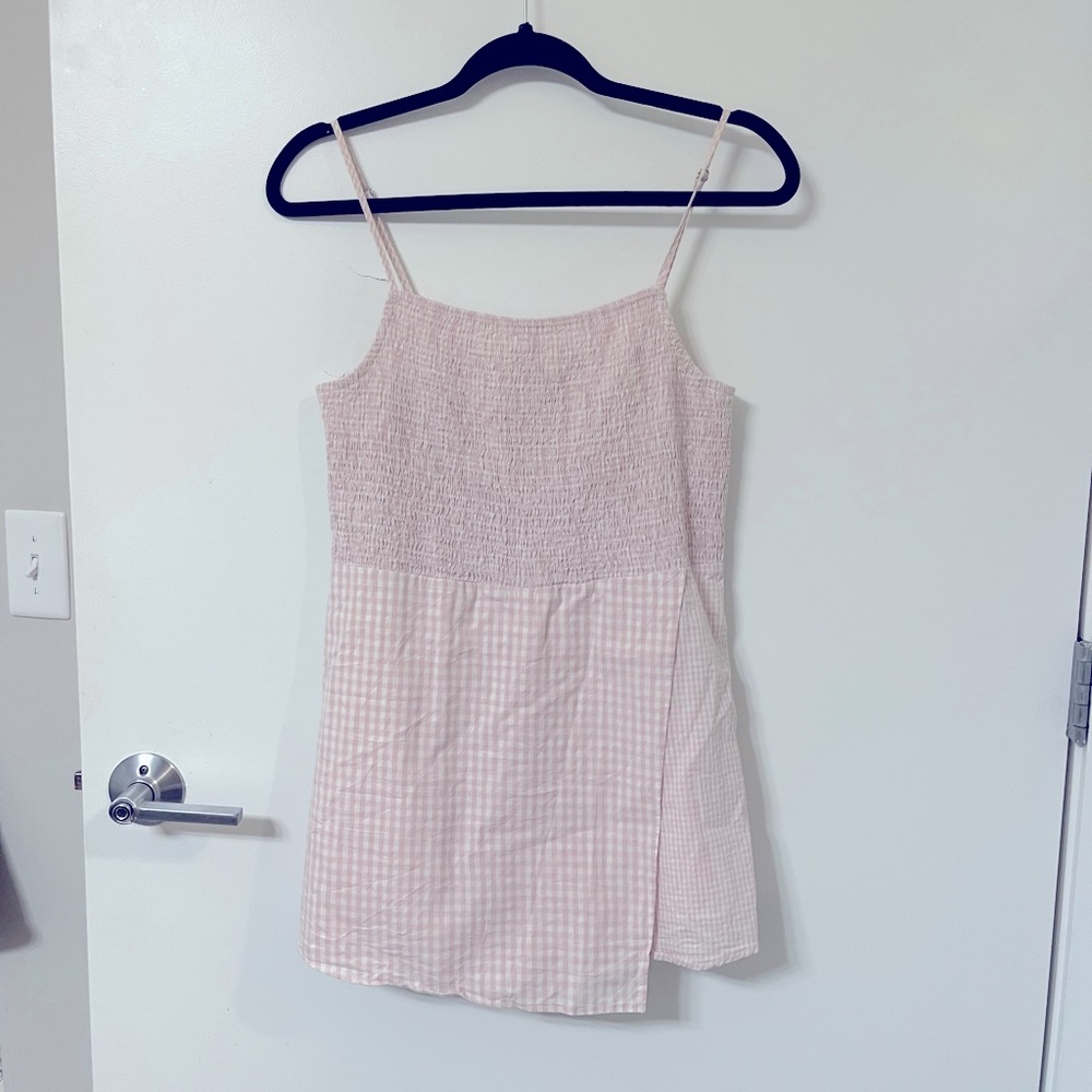 Urban Outfitters pink checkered smocked skort romper
